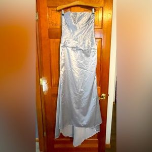 Gray/silver with embellishments, sequins, and rhinestones gown for sale.
